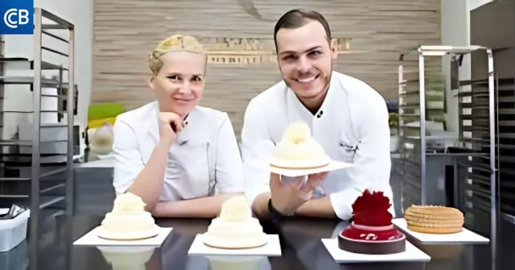 two chefs posing with cakes in front of a counter