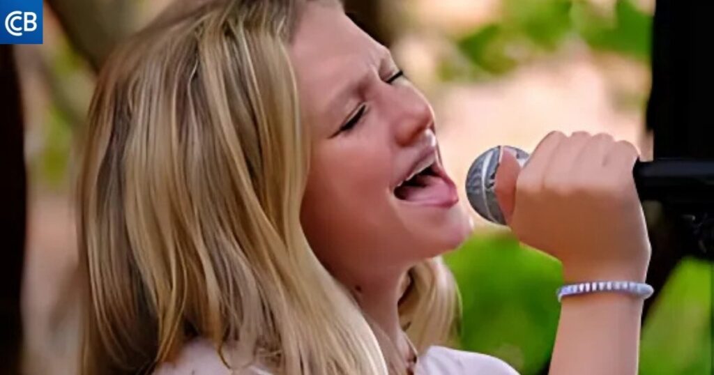 a person is singing into a microphone